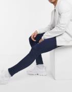 ASOS DESIGN - Super skinny ankle grazer-jeans i indigo-Blå