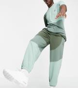 PUMA - Convey - Grønne joggingbukser med farveblokke - Kun hos ASOS