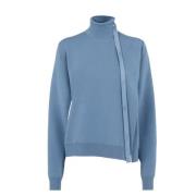 Pullover i pudderblå uld med udskæringer