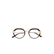 Ovale briller med brun transparent acetat front og brun havana laminat eller skildpadde med beige indsats. Håndlavet brillekollektion med guldbelagt stålbro og stænger. Integrerede acetat næsepuder og stangspidser. Tilgængelig med progressive eller t