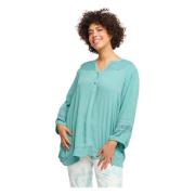 Flatterende V-hals bluse med feminine detaljer