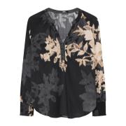 Feminine V-hals bluse med smock-manchetter