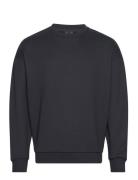 Soho Crew Neck Sweatshirt Tops Sweatshirts & Hoodies Sweatshirts Black Oakley Sports