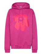 Runoja Unikko Placement Tops Sweatshirts & Hoodies Hoodies Pink Marimekko