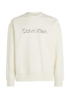 Shadow Embossed Logo Sweatshirt Tops Sweatshirts & Hoodies Sweatshirts Cream Calvin Klein