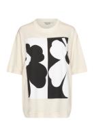 Veisto Unikko Placement Tops T-shirts & Tops Short-sleeved Cream Marimekko