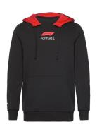 F1 Graphic Hoodie Sport Men Sport Clothing Sport Sweatshirts & Hoodies Sport Hoodies Black PUMA Motorsport