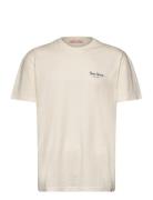 Application T-Shirt Tops T-Kortærmet Skjorte Beige Revolution